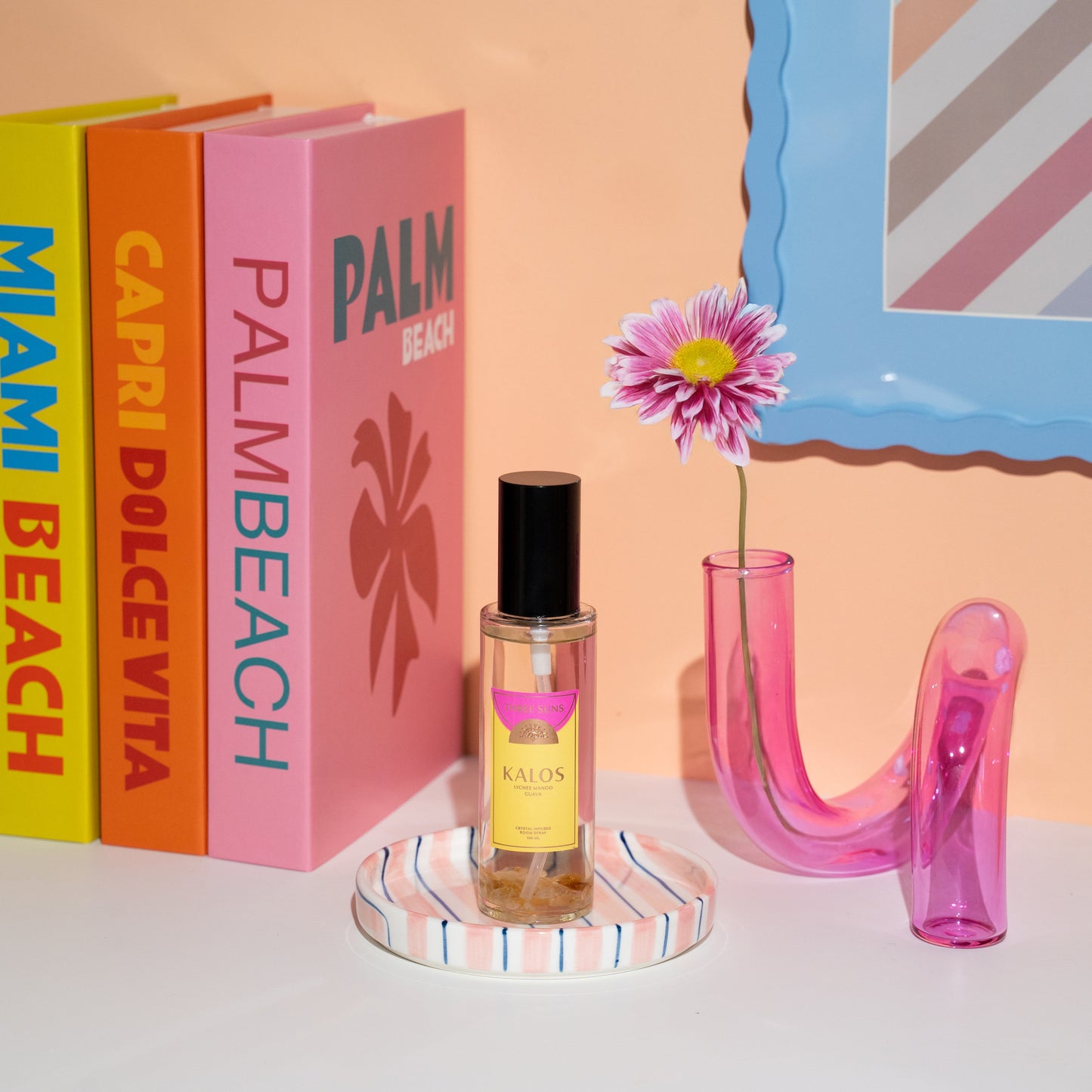 Kalos Room Spray of Confidence in clear glass bottle with black spray top, Citrine crystal infused tropical scent, premium home and linen fragrance mist Australia.