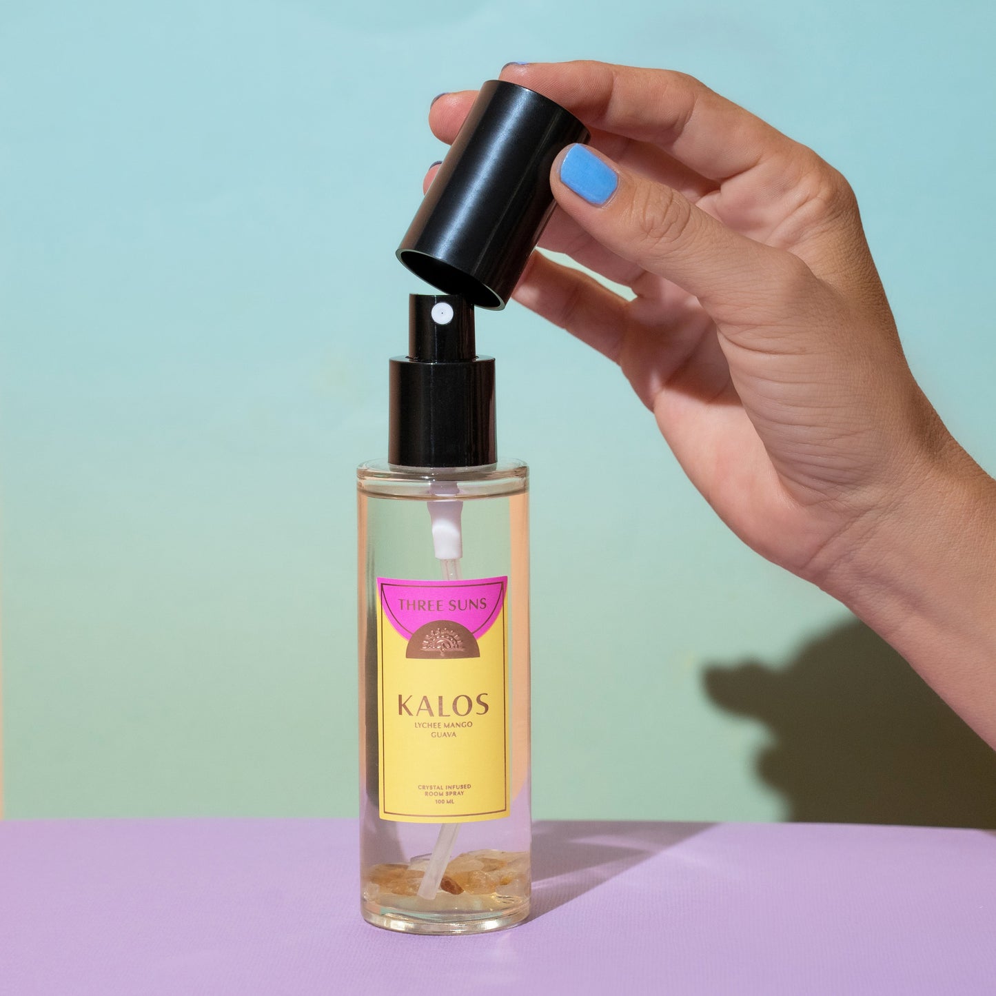Three Suns Kalos Crystal Room Spray, infused with Citrine crystals, tropical guava and coconut scent, luxury Australian perfume-based room spray for uplifting energy.