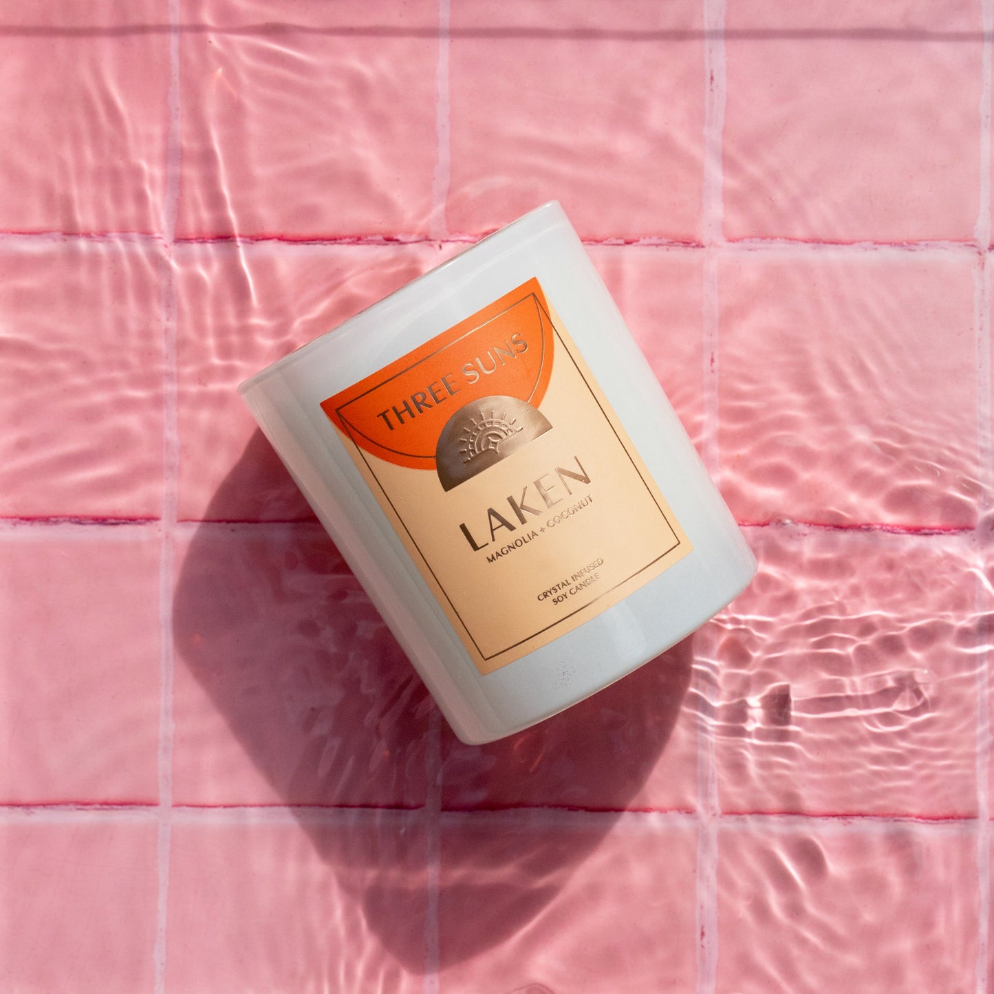 Luxury Laken Large Candle by Three Suns, crystal infused soy candle with creamy coconut and magnolia aroma, Carnelian crystals, premium Australian home fragrance.