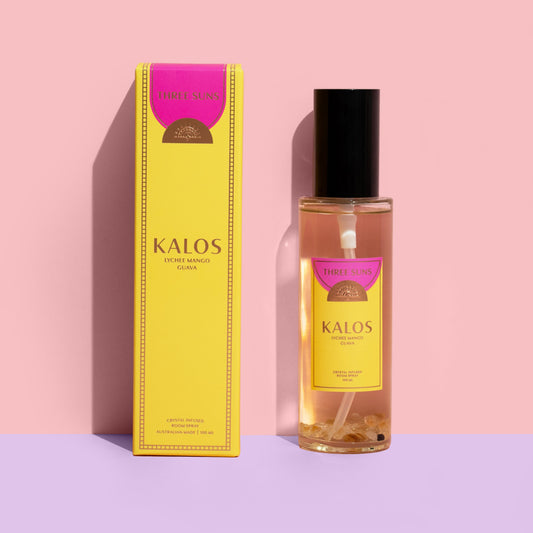 Kalos Crystal Infused Room Spray with black lid, tropical guava, mango, and coconut fragrance, infused with Citrine crystals for positivity, luxury perfume spray Australia by Three Suns.