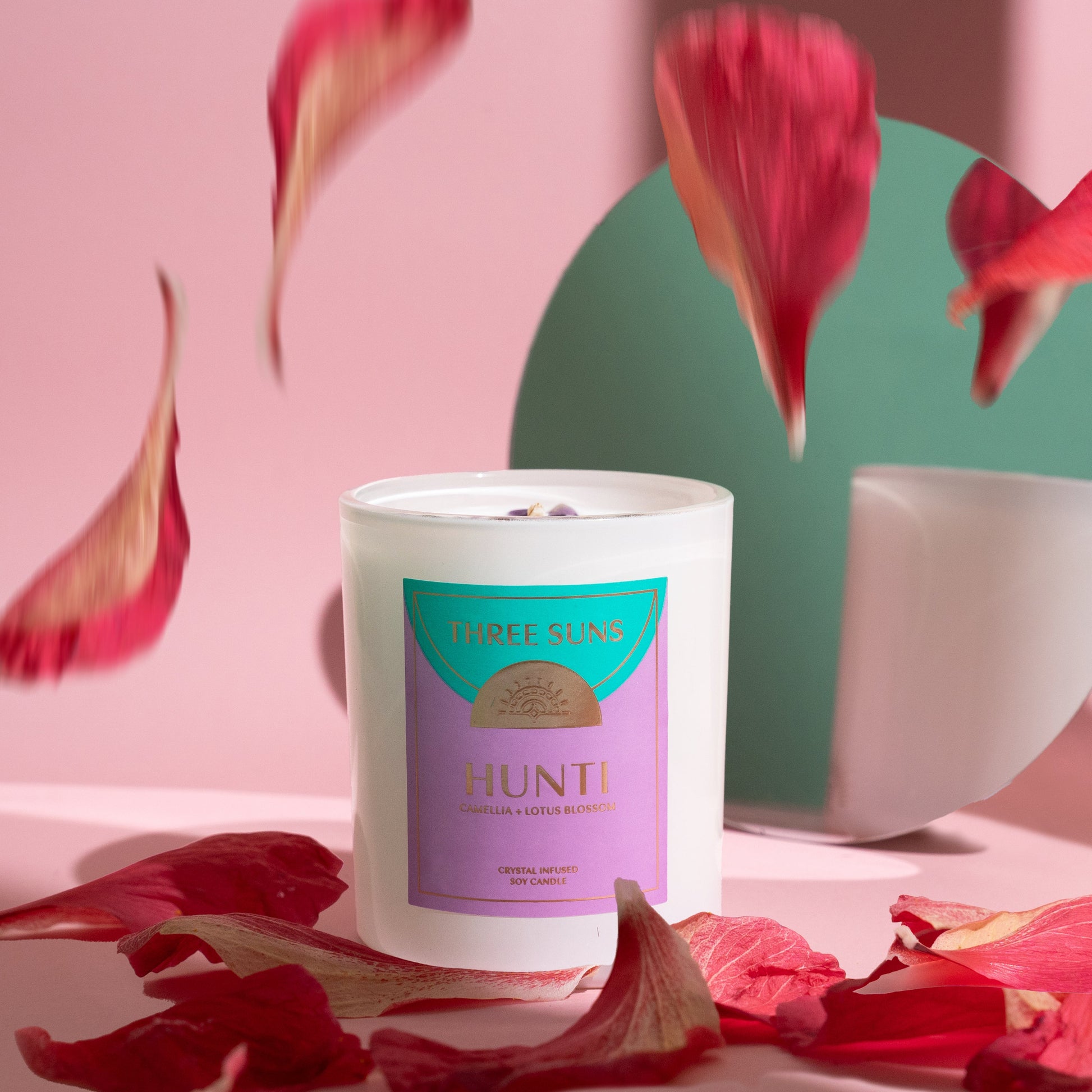 Hunti Large Soy Candle by Three Suns, infused with Amethyst and Tiger’s Eye crystals, soothing floral and sandalwood fragrance, luxury crystal candle Australia.