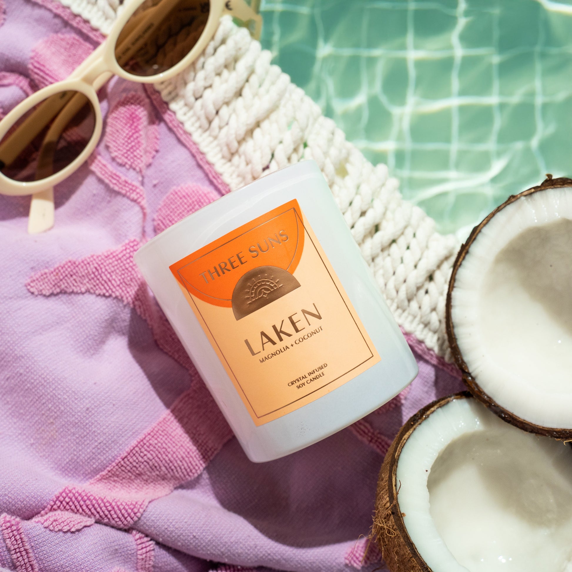 Laken Large Soy Candle by Three Suns, infused with Carnelian crystals, uplifting coconut and floral fragrance, luxury crystal candle Australia.