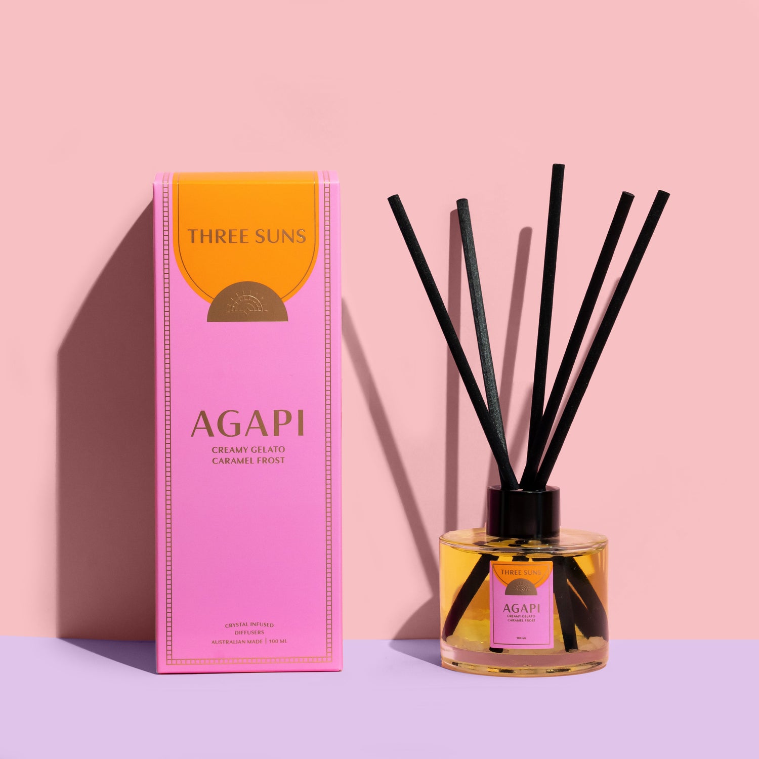 Agapi Crystal Infused Reed Diffuser with Rose Quartz and Clear Quartz crystals, sweet Gelato and Caramel Frost scent, luxury home fragrance diffuser Australia by Three Suns.
