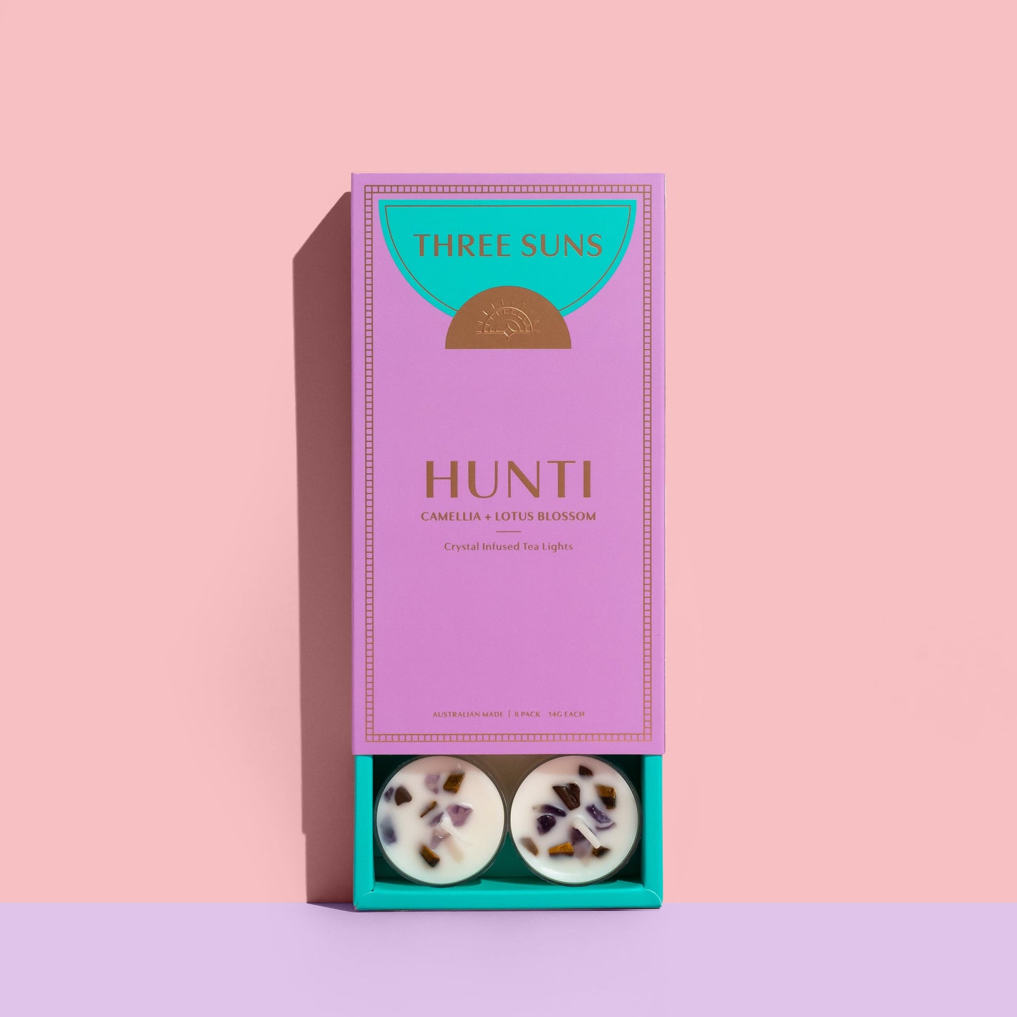 Hunti Crystal Infused Soy Tea Lights with Amethyst and Tiger’s Eye crystals, calming Camellia and Lotus Blossom scent, eco-friendly luxury candles Australia by Three Suns.